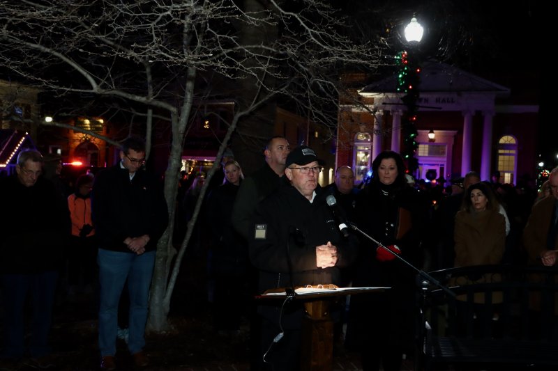Bill West, Georgetown mayor and retired state trooper, delivers remarks at the candlelight vigil.